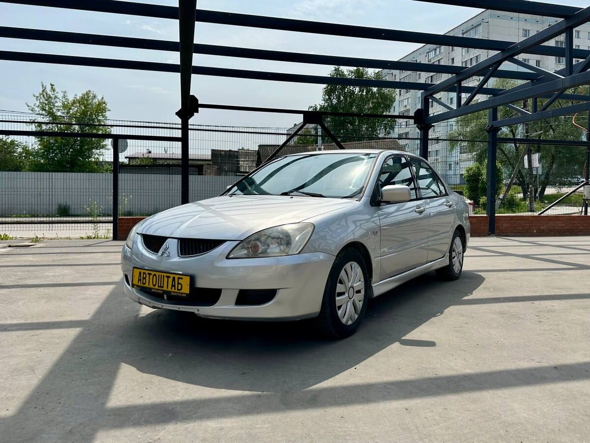 Mitsubishi Lancer 1.6 AT (98 л.с.), 2004, 185074 км