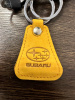 Брелок АвтоШТАБ желтый треугольник SUBARU (арт. 00001)